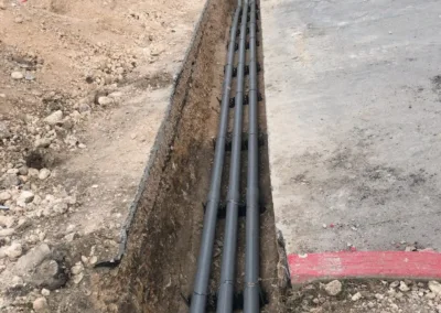 A group of workers are working on a construction site.